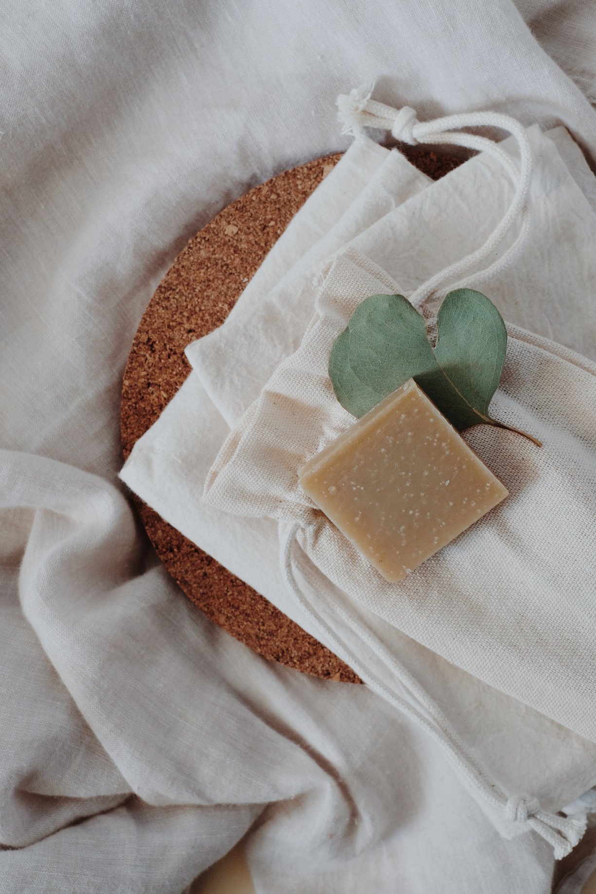 Soap or shampoo bars on reusable bag