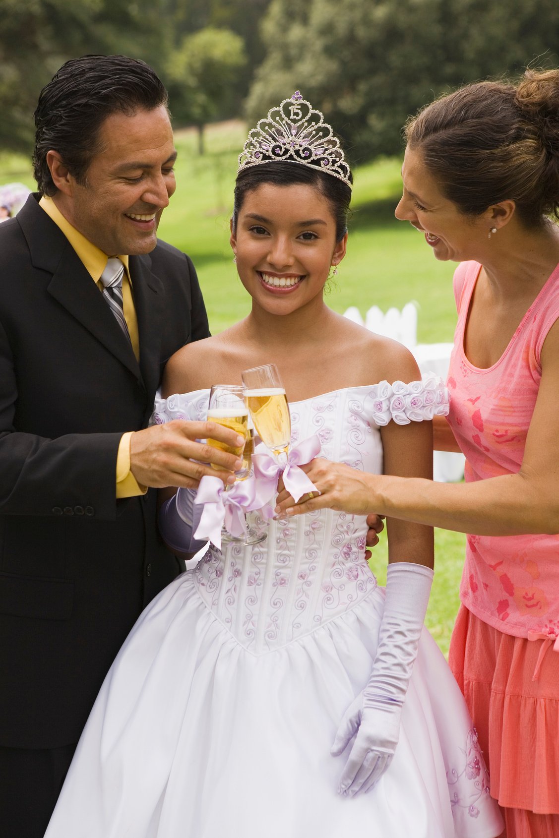 Family toasting at quinceanera